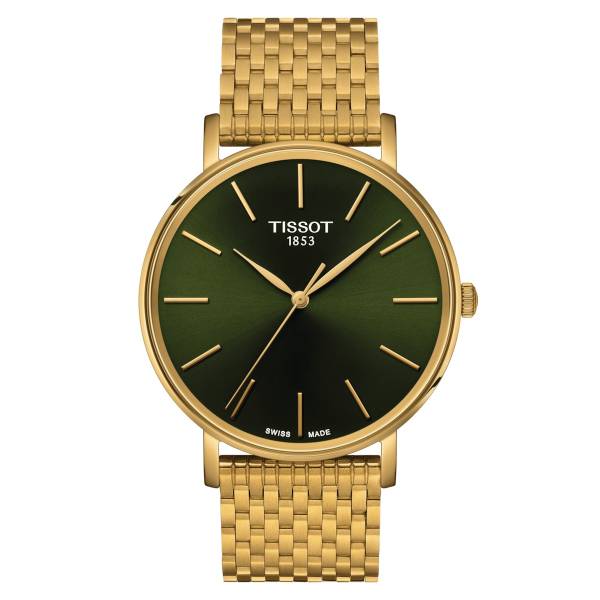 Montre Tissot dorée à cadran vert.