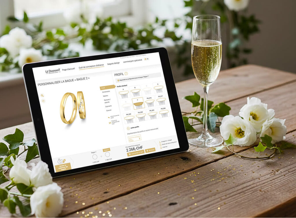 configurateur alliances Tablette affichant site vente bagues, verre de champagne